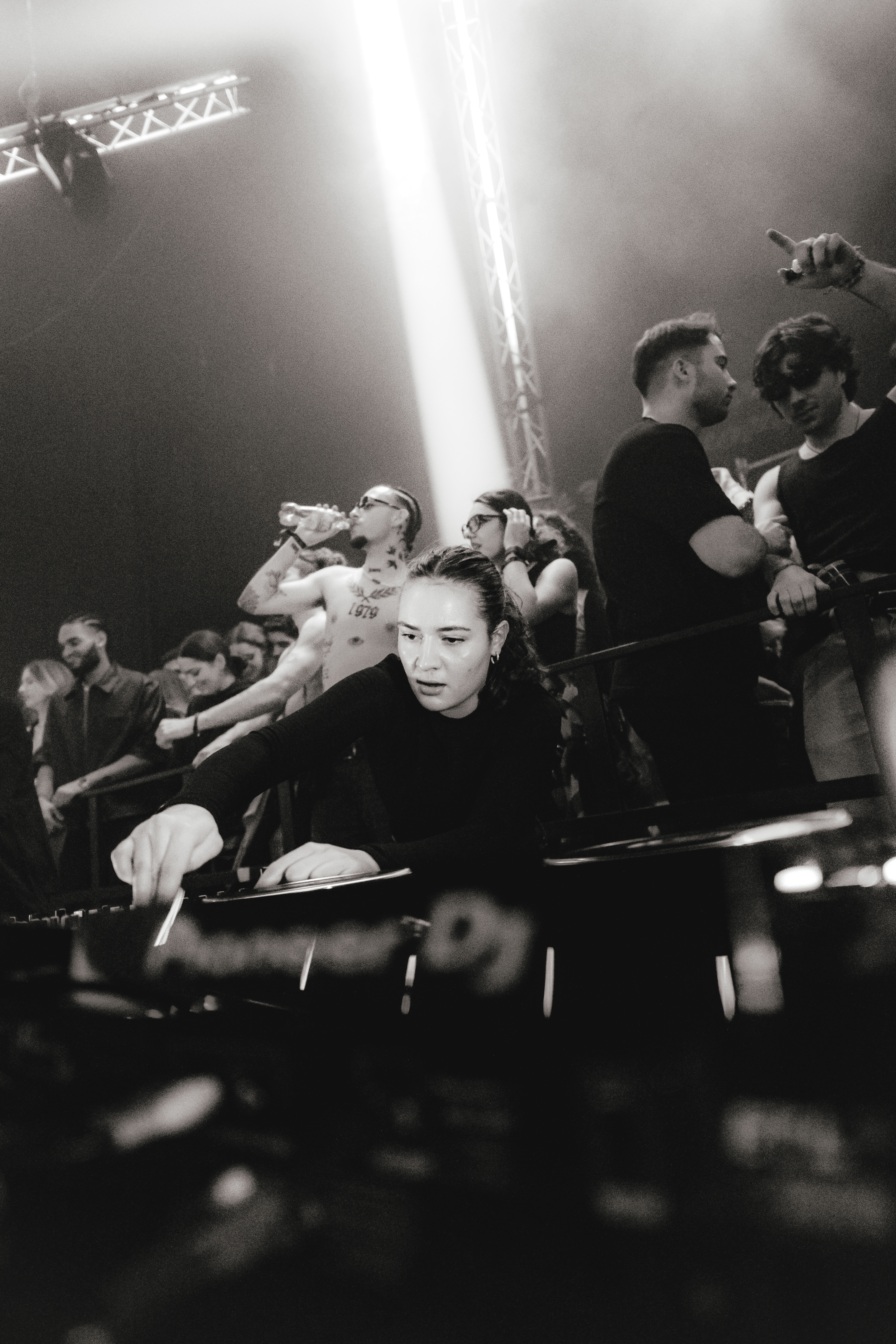 Louisa Pitz mixing on CDJs in front of a crowd